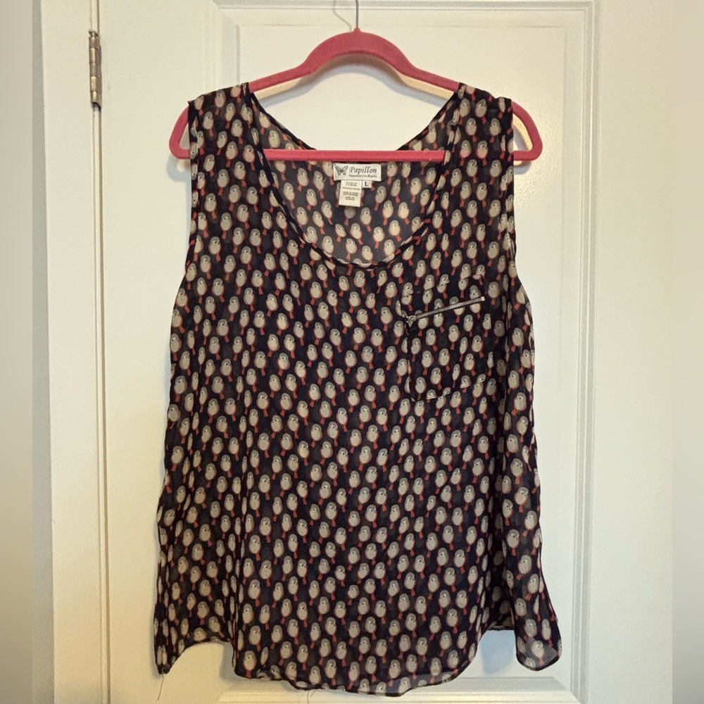 Papillon Navy Sleeveless Blouse with grey, cream and red bird pattern